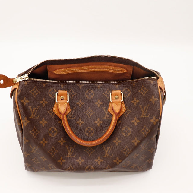 Vue des anses Louis Vuitton Speedy 30 cuir vachette occasion authentique — AMANA Vintage
