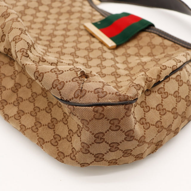 Détail côté couture Gucci Hobo Web canvas GG occasion — AMANA Vintage