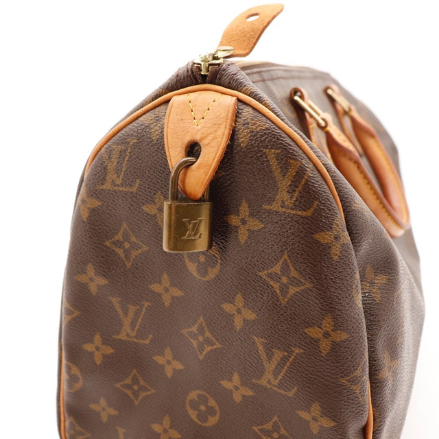 Vue du cadenas Louis Vuitton Speedy 30 Toile Monogramme occasion authentique — AMANA Vintage