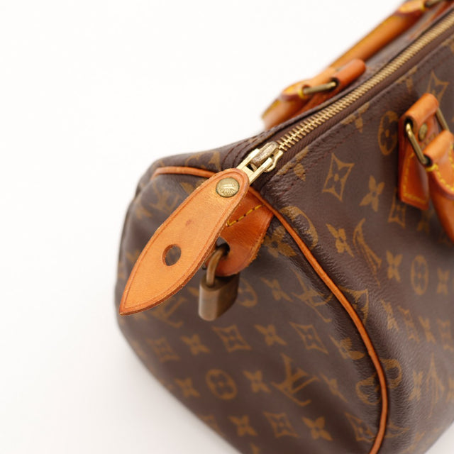 Détail cadenas Louis Vuitton Speedy 30 et languette vachette — AMANA Vintage