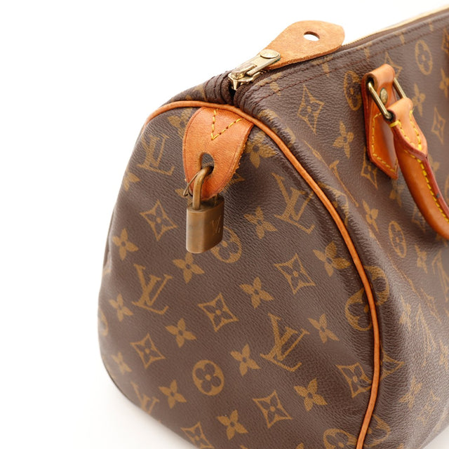 Vue trois quarts Louis Vuitton Speedy 30 anses vachette caramel — AMANA Vintage