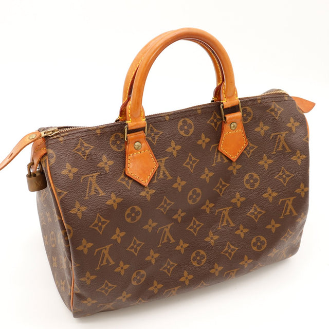 Détail coin inférieur Louis Vuitton Speedy 30 languette Louis Vuitton Paris — AMANA Vintage
