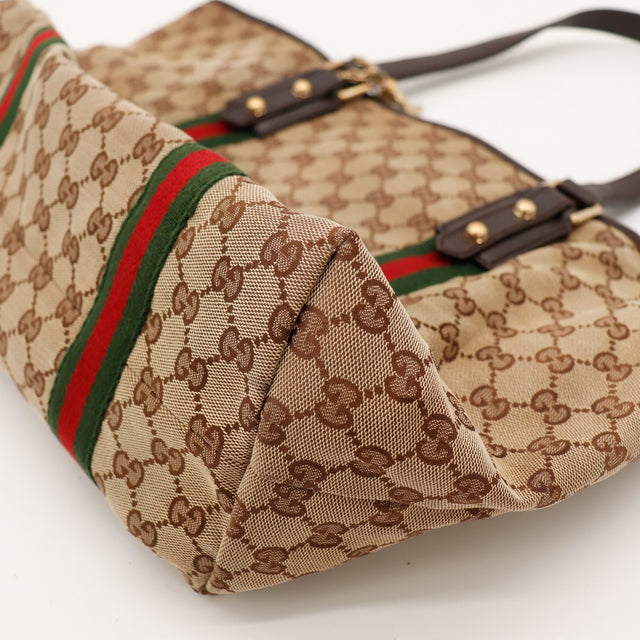 Detail coin superieur anses cuir marron Tote Bag Bamboo Gucci — AMANA Vintage
