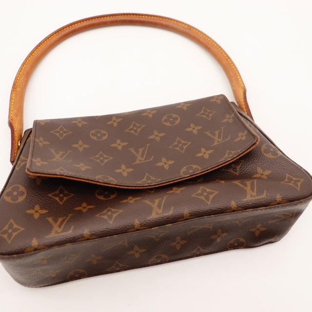 Vue de dos Louis Vuitton Mini Looping toile Monogram occasion authentique — AMANA Vintage