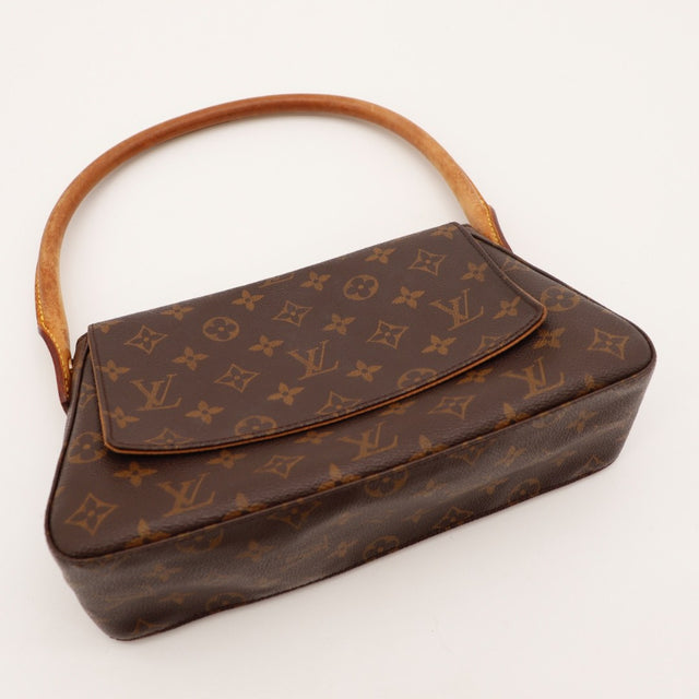 Détail zip laiton doré Louis Vuitton Mini Looping occasion — AMANA Vintage