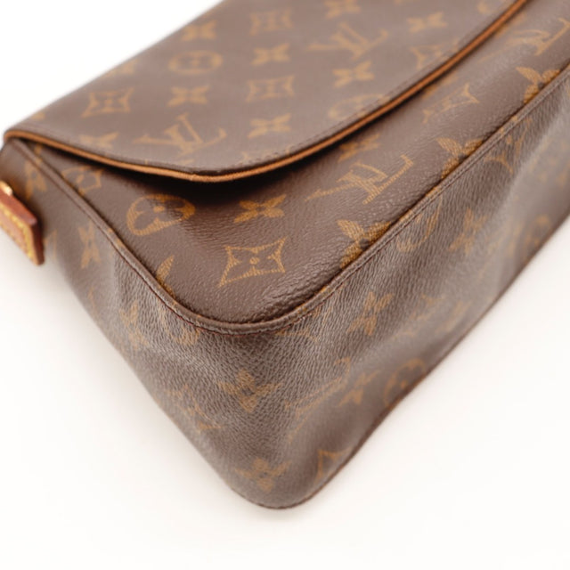 Vue de profil Louis Vuitton Mini Looping toile Monogram occasion — AMANA Vintage