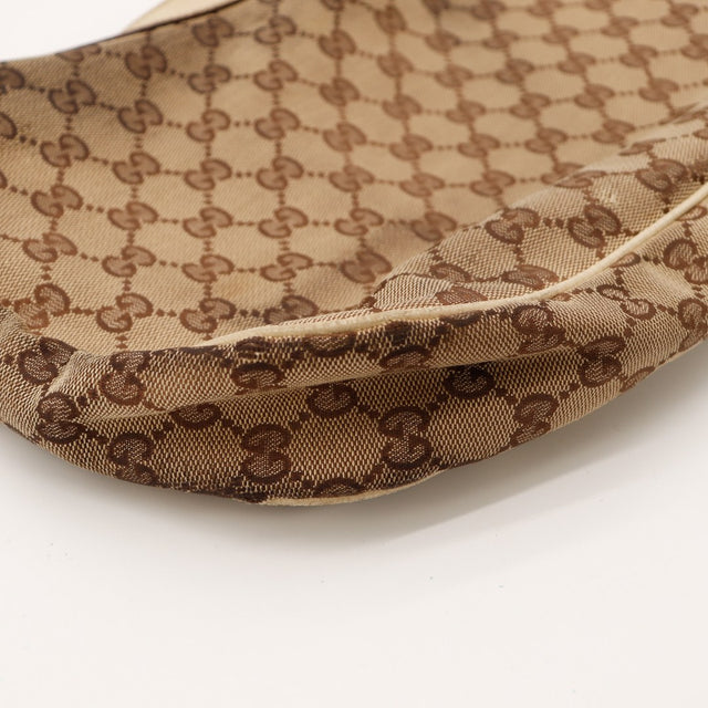 Detail fond coin inferieur usure Gucci Hobo canvas beige occasion — AMANA Vintage
