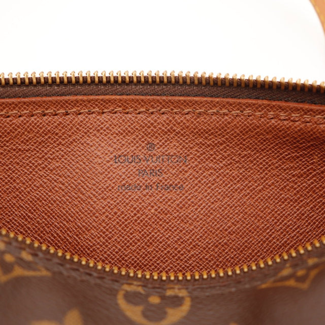 Vue de profil Louis Vuitton Papillon 26 Monogram occasion authentique — AMANA Vintage