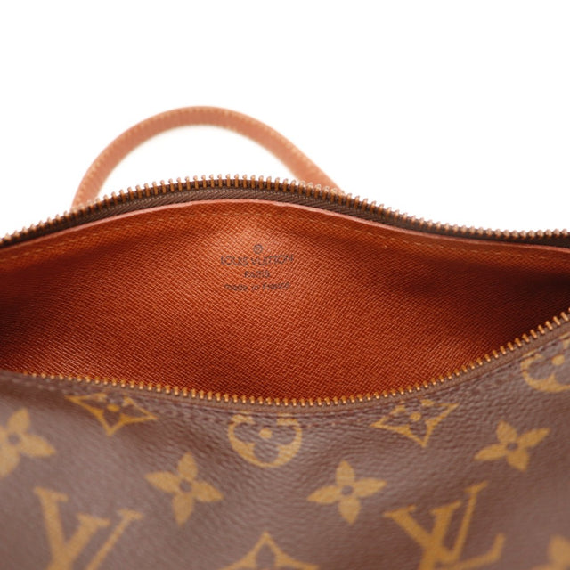 Détail de la fermeture Louis Vuitton Papillon 26 Toile Monogramme occasion authentique — AMANA Vintage