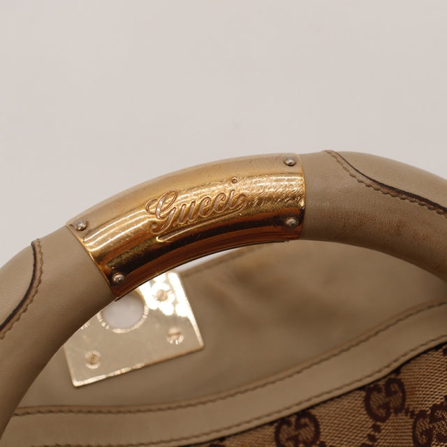 Detail coins renforts cuir Gucci Indy Hobo occasion authentique — AMANA Vintage
