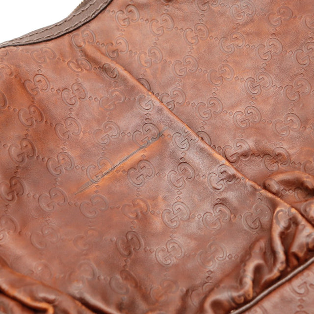 Détail cuir Guccissima embossé marron Gucci Hobo — AMANA Vintage