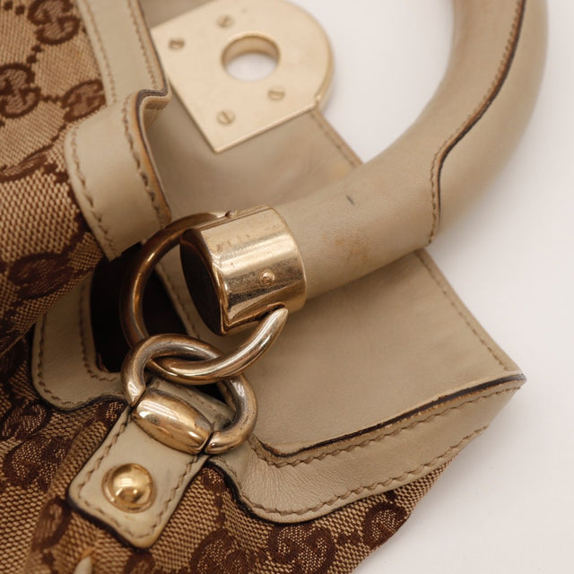 Vue de dos Gucci Indy Hobo toile monogrammée beige occasion authentique — AMANA Vintage