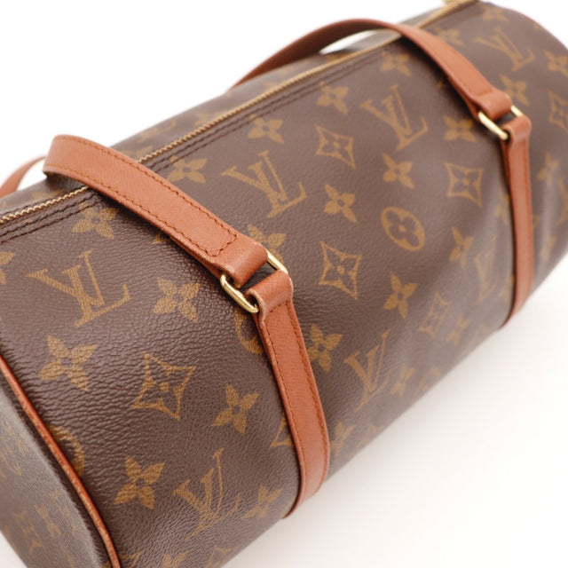 Détail de l'argenterie dorée Louis Vuitton Papillon 30 Toile Monogramme occasion authentique — AMANA Vintage