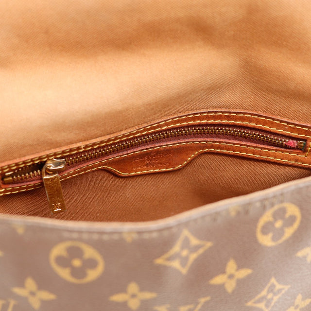 Vue intérieure poche zippée cuir vachette Louis Vuitton Mini Looping — AMANA Vintage