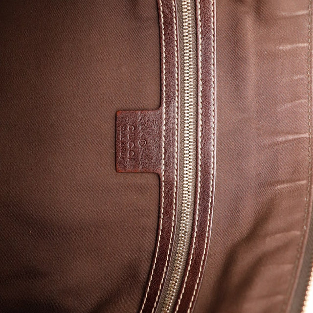 Detail interieur Gucci Hobo Web doublure textile marron zip occasion authentique — AMANA Vintage