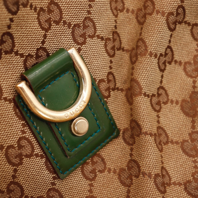 Vue de dos Gucci Tote Horsebit toile GG monogram beige — AMANA Vintage