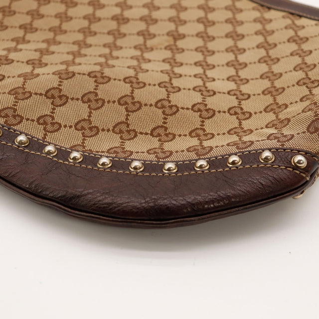 Detail coin inferieur second Gucci Hobo Web usure cuir marron clous — AMANA Vintage