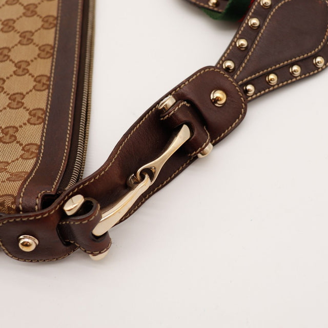 Detail fermoir Gucci Hobo Web boucle horsebit doree cuir marron occasion authentique — AMANA Vintage