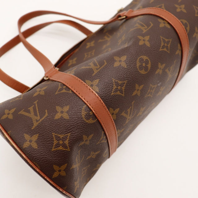 Détail des boucles dorées Louis Vuitton Papillon 30 Toile Monogramme occasion authentique — AMANA Vintage