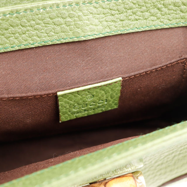 Intérieur doublure textile marron sac Gucci vert étiquette cuir — AMANA Vintage