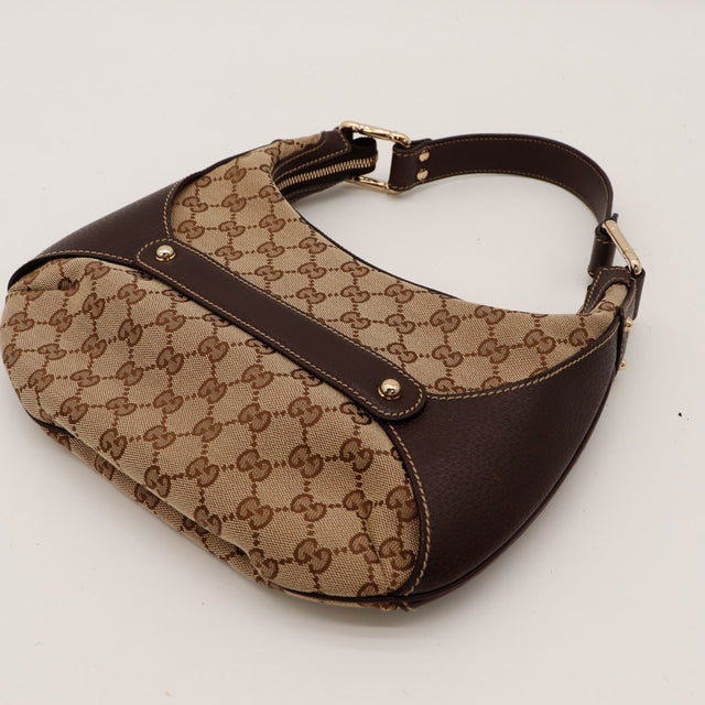 Vue de dos Gucci Hobo Bambou toile monogrammée cuir marron — AMANA Vintage
