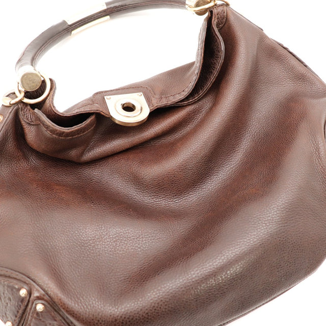 Détail cuir extérieur Gucci Hobo Bamboo marron frottements usage — AMANA Vintage