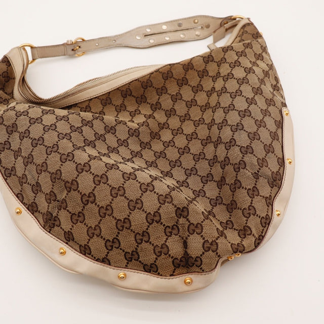 Vue de dos Gucci Hobo toile GG beige occasion authentique — AMANA Vintage