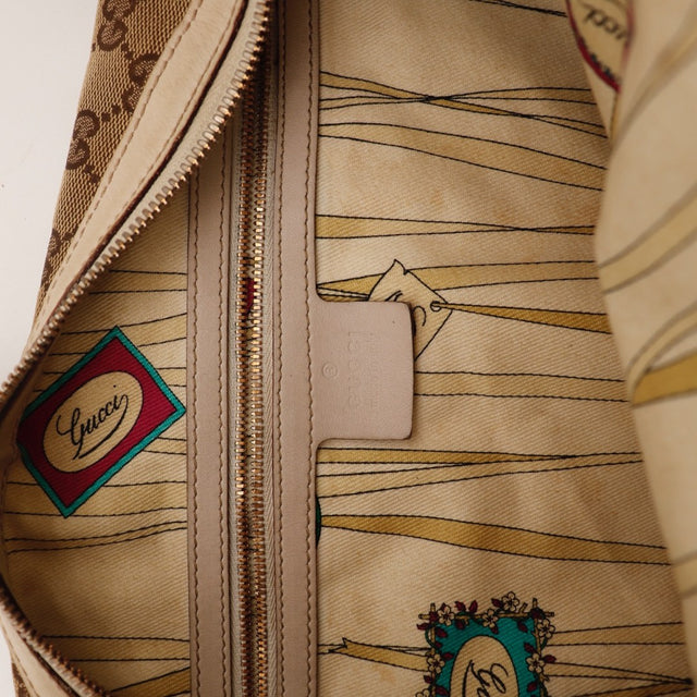 Détail base Gucci Hobo toile GG occasion authentique — AMANA Vintage