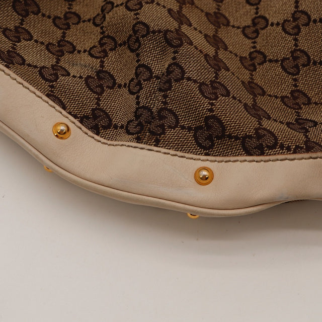 Détail tirette cuir Gucci Hobo toile GG occasion authentique — AMANA Vintage