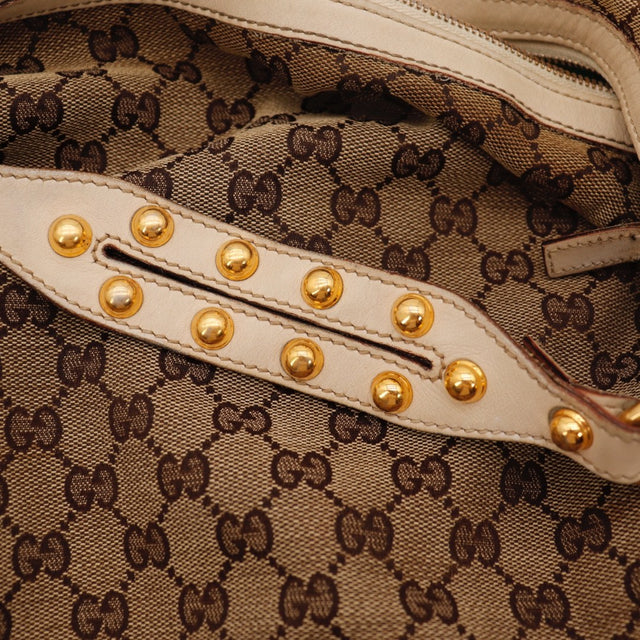 Vue de côté Gucci Hobo toile GG beige occasion authentique — AMANA Vintage
