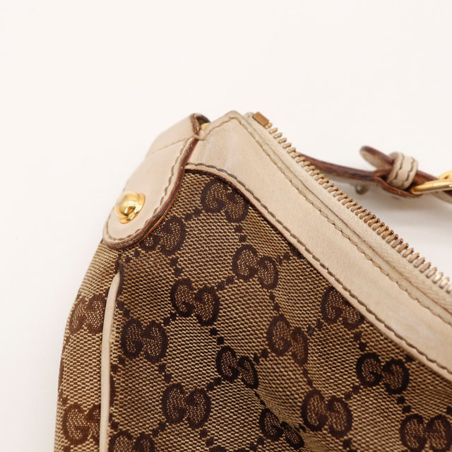Détail toile monogrammée Gucci Hobo occasion authentique — AMANA Vintage