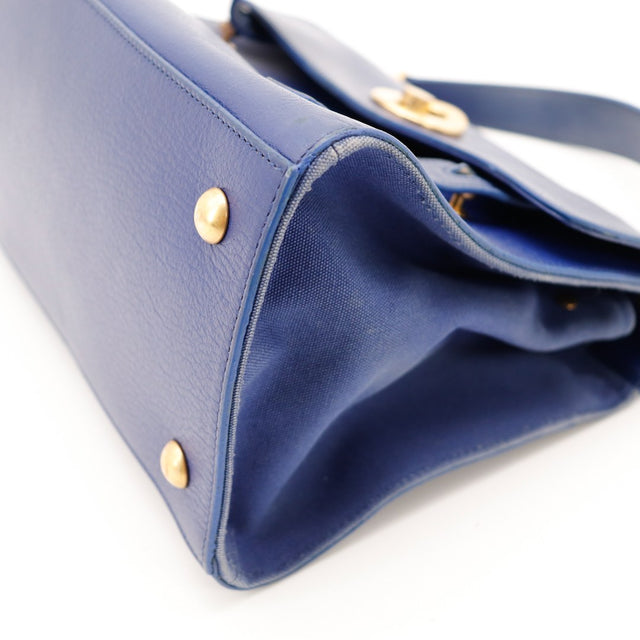 Vue latérale fond Saint Laurent Muse Two cuir grené — AMANA Vintage
