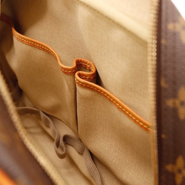 Vue de côté Louis Vuitton Deauville Toile Monogramme occasion authentique — AMANA Vintage