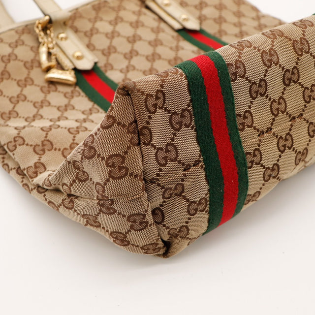 Detail coin inferieur gauche tache Tote Web Gucci occasion — AMANA Vintage