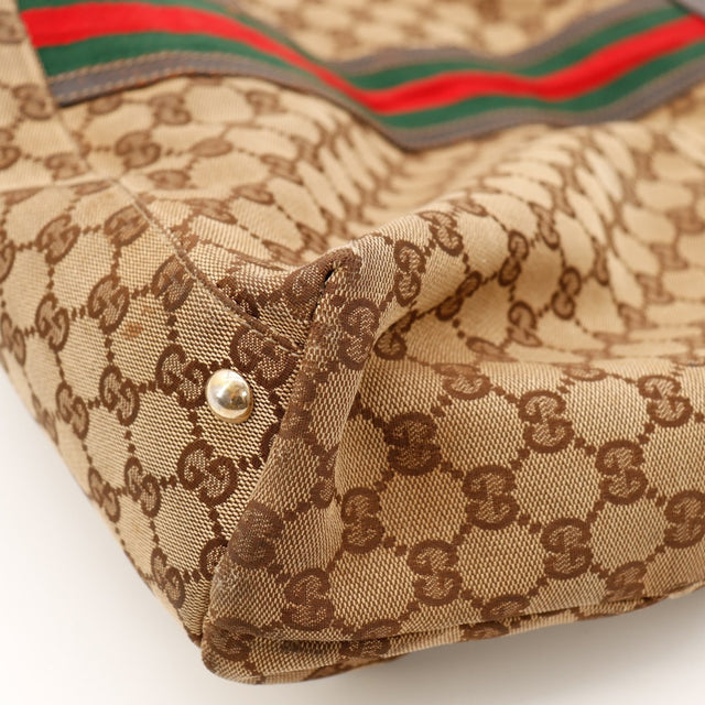 Detail coin inferieur Gucci Tote Web usure cuir visible — AMANA Vintage