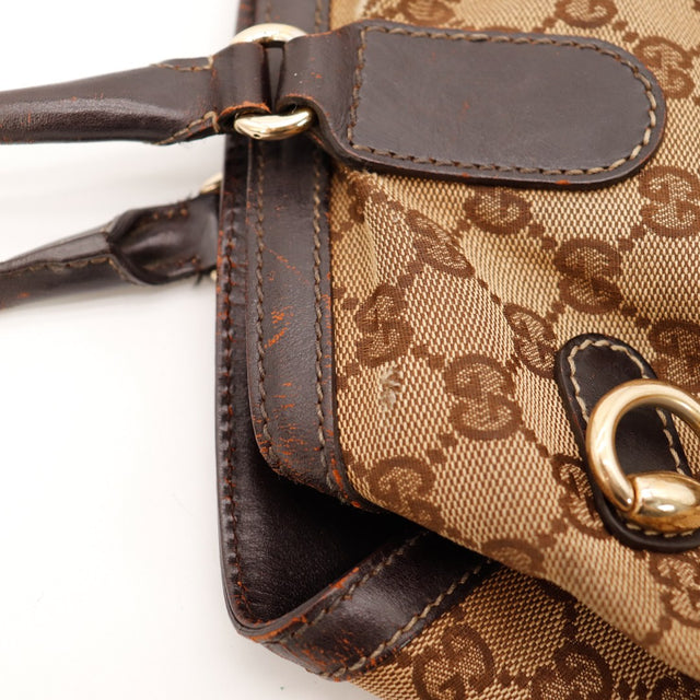 Detail fixation anse cuir Gucci Tote Web usure cuir marron — AMANA Vintage