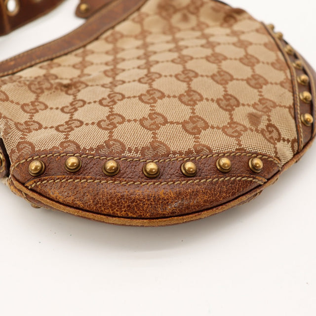 Détail usure cuir bas du sac Gucci Hobo Web clous dorés — AMANA Vintage