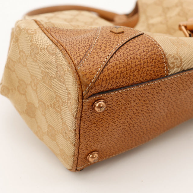 Détail coin inférieur Gucci Hobo Bambou cuir grené — AMANA Vintage