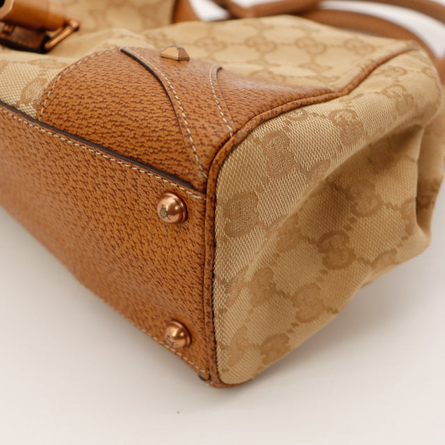Détail coin inférieur droit Gucci Hobo Bambou toile GG Canvas — AMANA Vintage