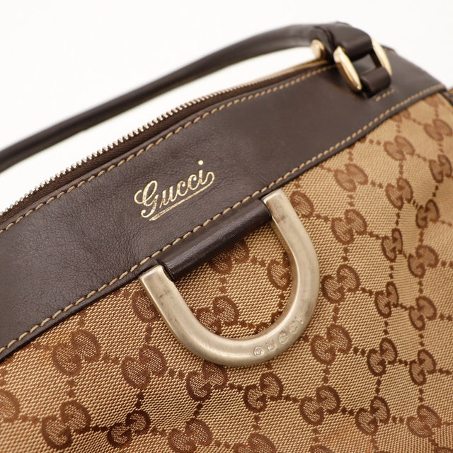 Détail D-ring et bande cuir marron Gucci Tote Bag occasion — AMANA Vintage