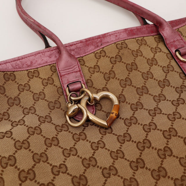 Detail breloque bambou et coeur Tote Bag Gucci bordeaux — AMANA Vintage