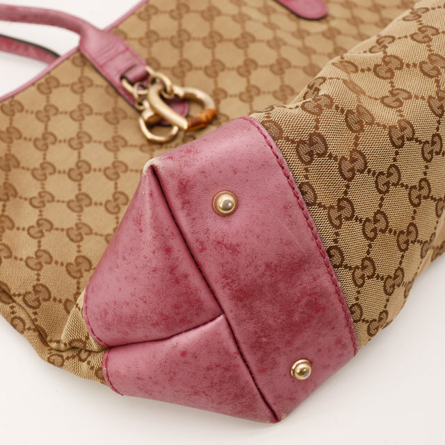 Detail coin inferieur gauche cuir bordeaux use Tote Bag Gucci — AMANA Vintage