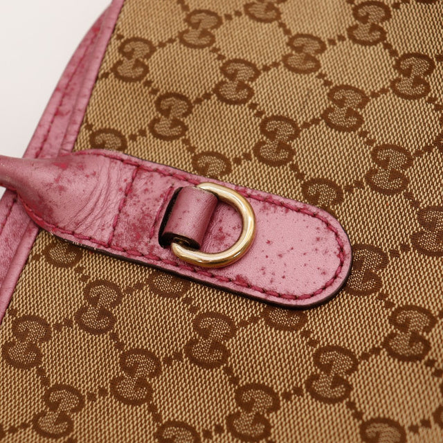 Detail tab en cuir bordeaux use Tote Bag Gucci — AMANA Vintage