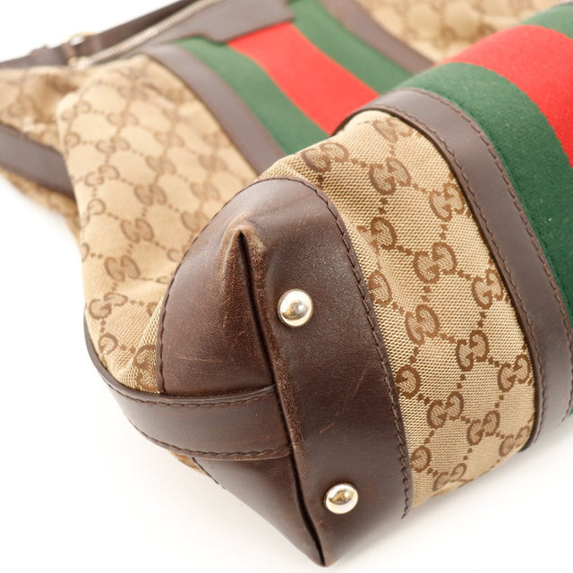 Detail canvas frotte Gucci Hobo Web fibres usees visibles occasion — AMANA Vintage