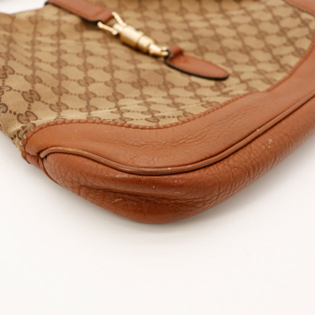 Détail coin inférieur Gucci New Jackie frottements cuir cognac — AMANA Vintage