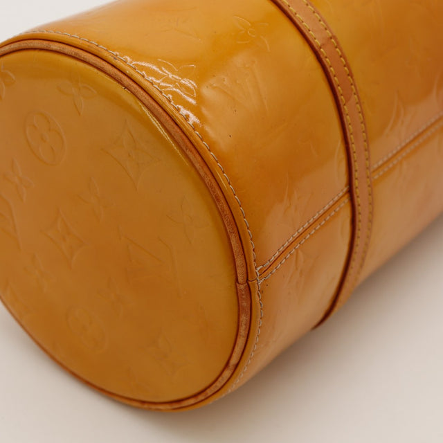 Détail base cylindrique Louis Vuitton Bedford Vernis caramel — AMANA Vintage
