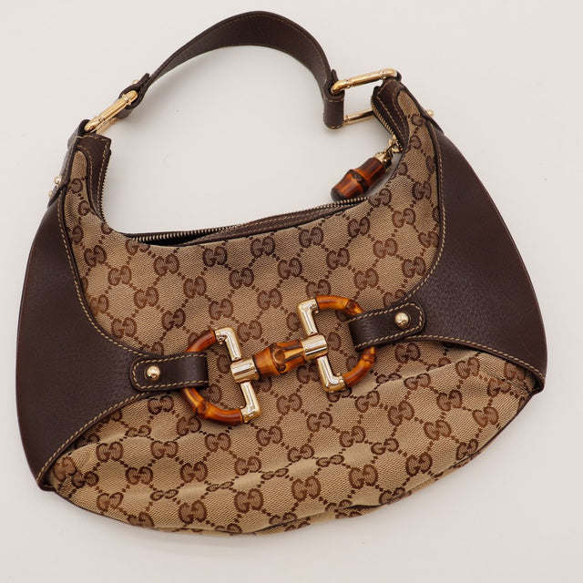 Détail intérieur doublure textile marron Hobo Bambou Gucci — AMANA Vintage