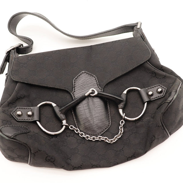 Détail fermoir Horsebit mors de cheval argenté cuir noir Gucci — AMANA Vintage