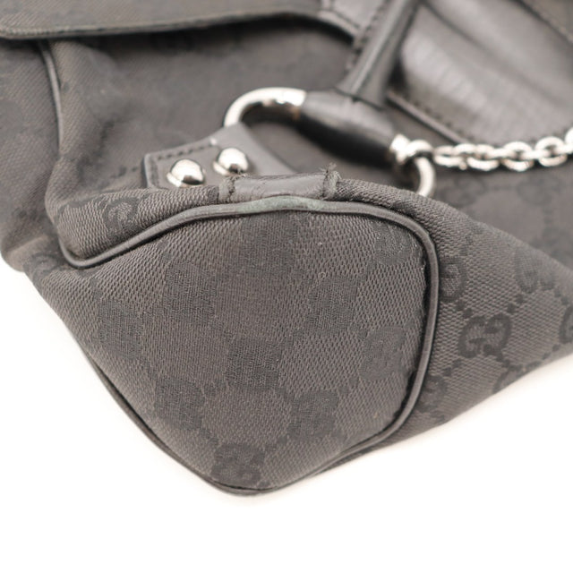Détail coin inférieur droit Gucci Horsebit Hobo toile noire — AMANA Vintage