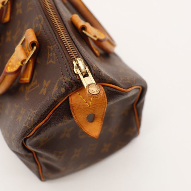 Vue laterale Louis Vuitton Speedy 25 cuir vachette patine — AMANA Vintage